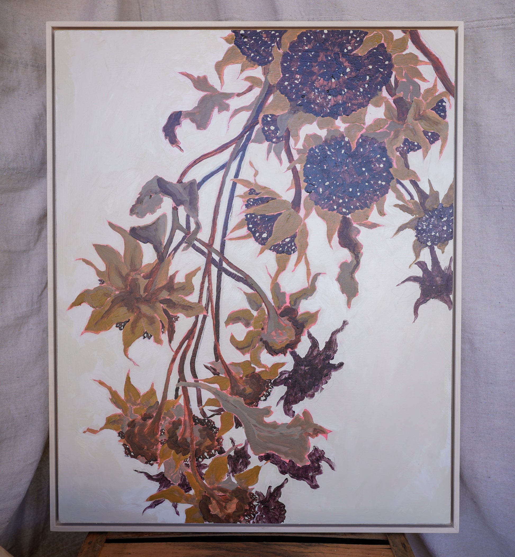 Original acrylic painting of dried sunflowers on a cream background in a natural maple floater frame