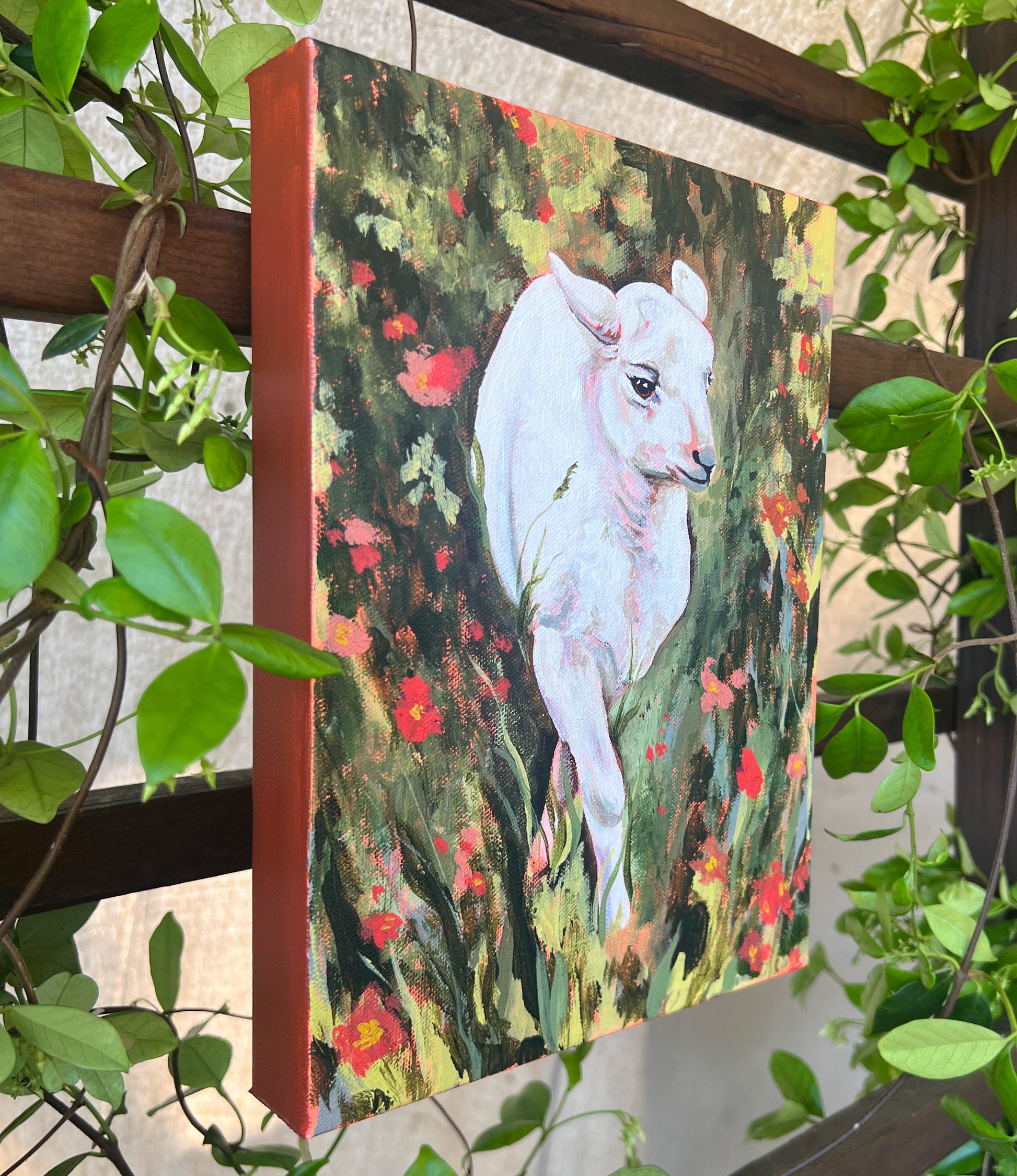 Lamb painting detail with greenery