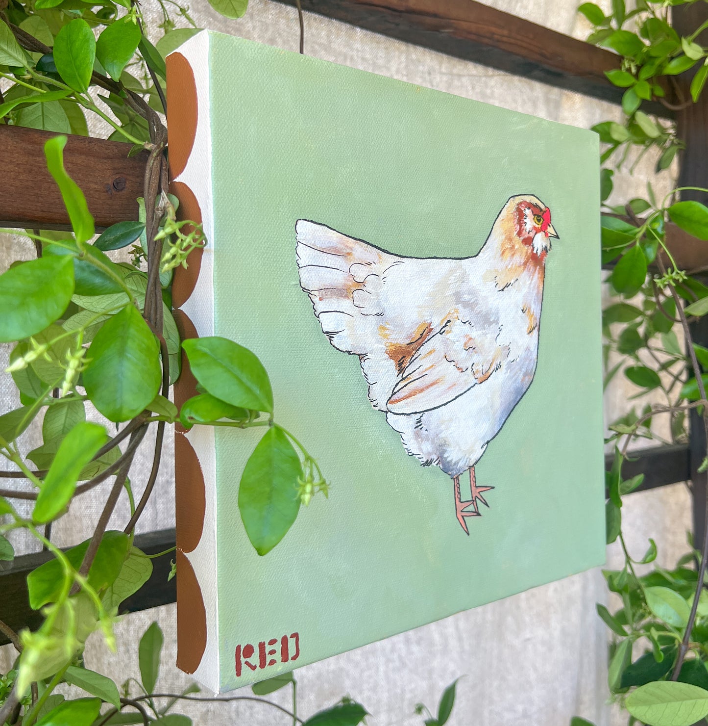 chicken painting with mint green background detail and greenery surrounding