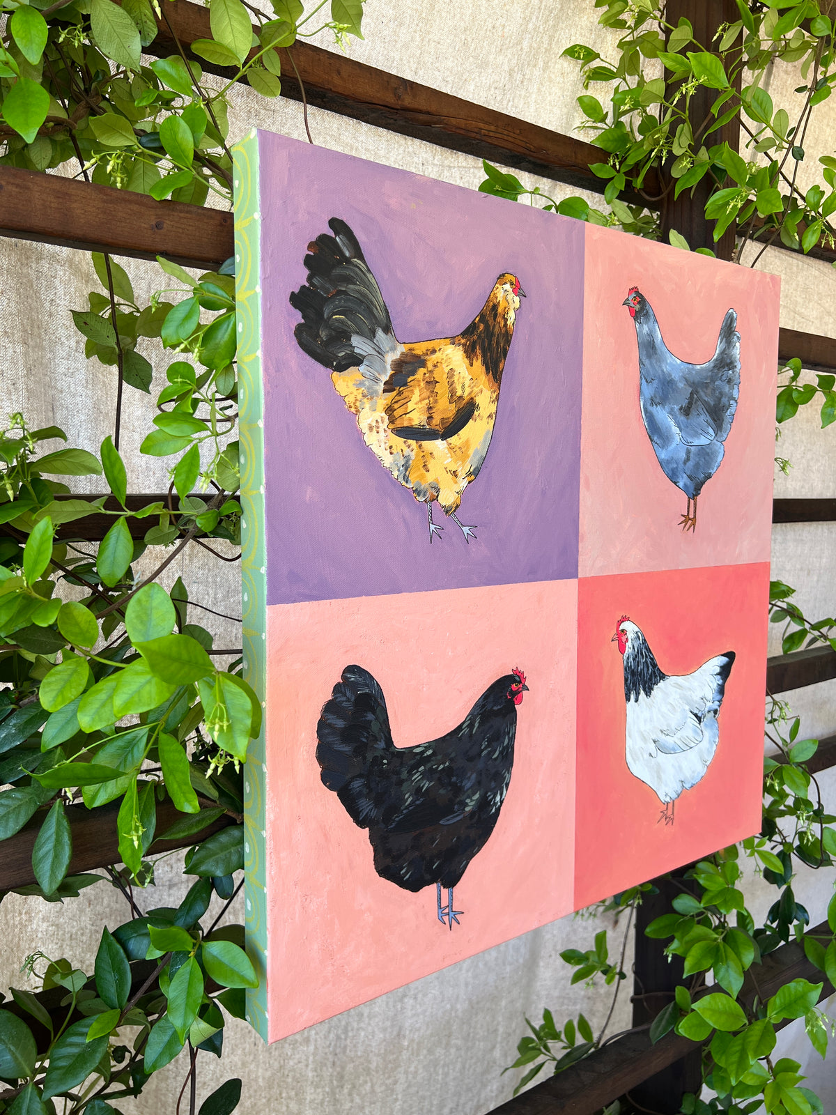 Chicken grid painting with colorful backgrounds and greenery surrounding